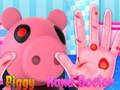 Juego Piggy trata sus manos  en línea